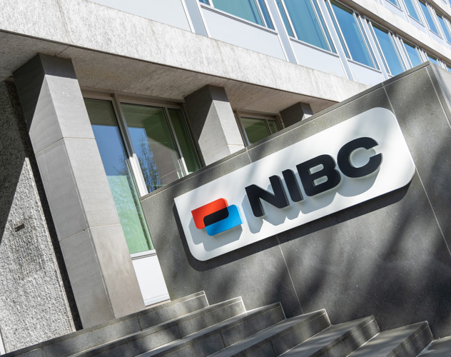 NIBC company logo on a facade, visible above the stairs leading to the entrance.
